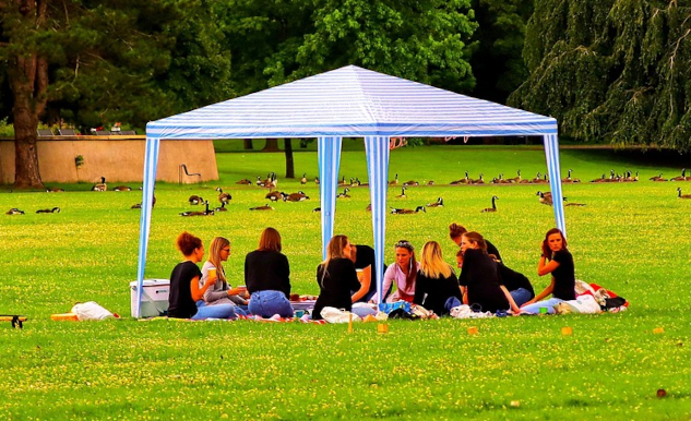 Sacred Circles: A Path to Deep Connection Photo of a group gathered under an outdoor canopy. Image by Thomas G. from Pixabay.