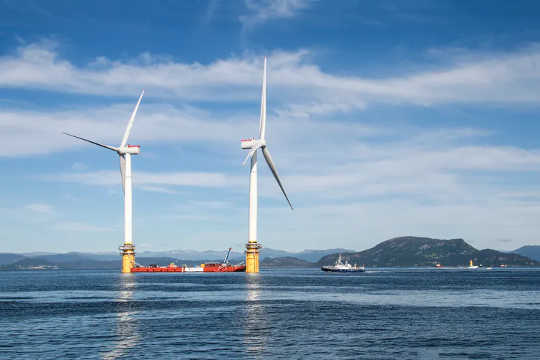 Two of the five turbines used in the world’s first floating wind farm, Hywind Scotland.