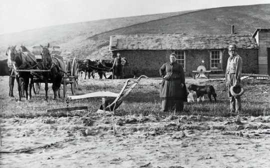Settlers like these in Custer County, Nebraska, in 1870, got free or low-cost land from the government under the Homestead Act.