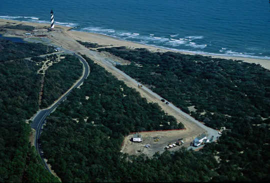 In 1999 the National Park Service moved the historic Cape Hatteras Lighthouse 2,900 feet inland (new site at lower right in photo) to protect it from shoreline erosion.
