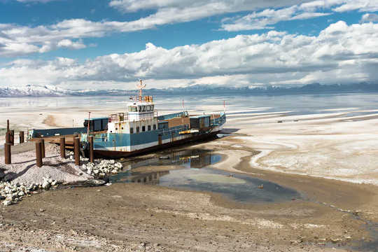 A boat is left to rust as Lake Urmia shrinks.