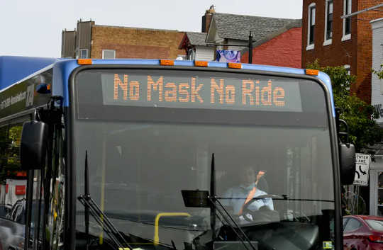 12 14 2 A bus reminds people ‘No Masks No Ride’ in September 2020.  (masks and mandates how individual rights and government regulation are both necessary for a free society)