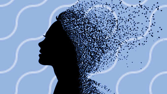 silhouette of a woman's head and it is disintegrating