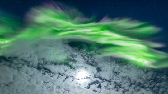 Photo of aurora and moon by Markus Varik on February 22, 2021, Tromsø Norway