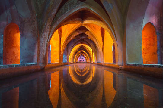 arches reflected in water