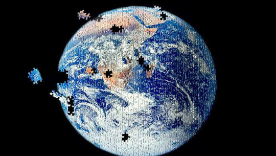 planet earth with puzzle pieces missing