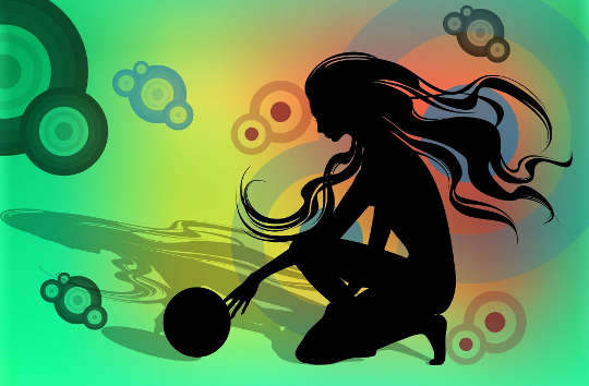 a silhouette of a girl whose hair is flying in the wind