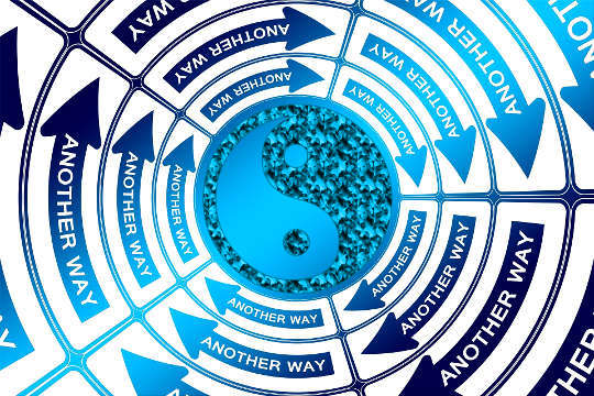 a Yin-Yang symbol in the middle of a circle filled with circular arrows with the words "Another Way" in each arrow