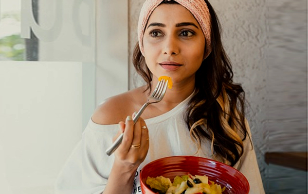 a woman eating healthy food