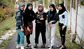 young Muslim women in jeans. skirts, leggings, and other "modern" clothing