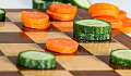 vegetable slices on a chess board