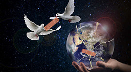 two doves bringing a Band-Aid to Planet Earth